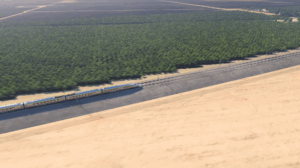 A high-speed rail train travels across a valley landscape
